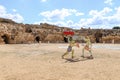 Figures of two fighting gladiators in the arena of the ancient amphitheater in the ruins of the Beit Guvrin amphitheater, near