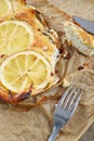 Kisch with fish and slices of lemons Royalty Free Stock Photo