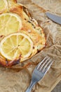 Kisch with fish and slices of lemons Royalty Free Stock Photo