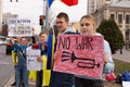 KISHINEV, MOLDOVA - March, 29 2022: Meeting of people with ukrainian flags and posters near embassy of the Russian Federation.