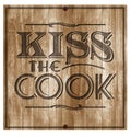 Kiss the Cook Wood Engraved Plaque Sign Royalty Free Stock Photo