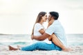 Kiss couple, beach love and happy honeymoon, travel and summer relaxing at seashore together. Romantic man, smile woman Royalty Free Stock Photo