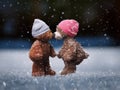 Kiss cute Teddy bears in the falling snow.