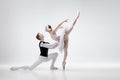 Young graceful couple of ballet dancers on white studio background Royalty Free Stock Photo