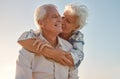 Kiss, hug and senior couple with love, care and happiness in their marriage together in nature. Happy, relax and smile Royalty Free Stock Photo