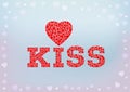 Kiss inscription with heart symbol made of small heart shapes on blue soft background.