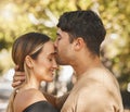 Kiss, love and romance with a couple bonding outdoor during a date on a summer day. Happy, trust and smile with a young Royalty Free Stock Photo