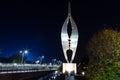 The Kiss by night, a silver metal artwork of the artist Joop van Egmond on the Nagelbrug near the Roundabout in Voorhout