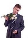 Kissed man with white roses Royalty Free Stock Photo