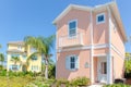 KISSIMMEE, FLORIDA - MAY 29, 2019 - Margaritaville Resort Orlando. Peach and yellow caribbean island key west theme cottages next