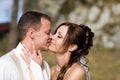 Kissing Bridal Couple Royalty Free Stock Photo