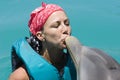 Kissing a Dolphin Royalty Free Stock Photo