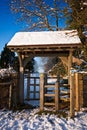 Kissing gate on a bright winter afternoon Royalty Free Stock Photo