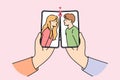 Kissing people in phone screens, for concept online dating and flirting through apps in smartphones