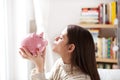 Kissing piggy bank