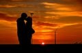Kissing at sunset