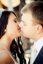 Kissing wedding couple