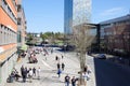 Victoria Tower, skyscraper in Kista, people during lunchtime.