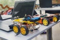 Kit models and laptops on the table on robotics