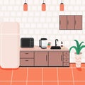 kitchen interior with orange floor, frige, microwave, kettle, teapod Royalty Free Stock Photo