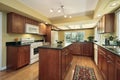 Kitchen with black granite counters