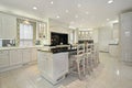 Kitchen with black top marble island