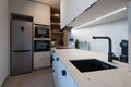 Kitchen with built in appliances of urban apartment Royalty Free Stock Photo