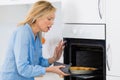 Kitchen burn on hand caused by heating oven Royalty Free Stock Photo