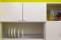 Kitchen cabinets with plate dryer. Facade of kitchen furniture