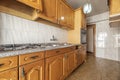 Kitchen with Castilian-style wooden furniture in gloss varnished pine, Royalty Free Stock Photo