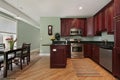 Kitchen with cherry wood cabinetry Royalty Free Stock Photo