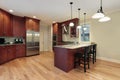 Kitchen with cherry wood cabinetry Royalty Free Stock Photo