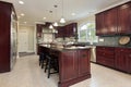 Kitchen with cherry wood cabinetry Royalty Free Stock Photo