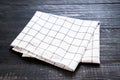 kitchen cloth (napkin) on wood background Royalty Free Stock Photo