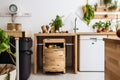 a kitchen with compost bin and worm farm, creating a sustainable ecosystem