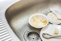 Kitchen conceptual image. Dirty sink with many dirty dishes. Royalty Free Stock Photo