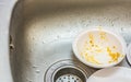 Kitchen conceptual image. Dirty sink with many dirty dishes. Royalty Free Stock Photo