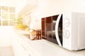 Kitchen counter closeup microwave oven cooking machine Royalty Free Stock Photo