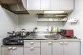 Kitchen counters and kitchen utensils in the room at the condominium Royalty Free Stock Photo