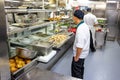 Kitchen crew work in the galley of a cruise ship in the Caribbean Sea Royalty Free Stock Photo