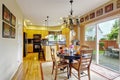 Kitchen with dining area and exit to backyard Royalty Free Stock Photo