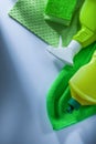 Kitchen dishwashing cloth bottles sprayer sponge on white backgr Royalty Free Stock Photo