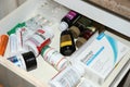 A kitchen drawer filled with over the counter drugs. Royalty Free Stock Photo