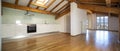 Kitchen in empty apartment with wooden beams Royalty Free Stock Photo