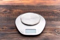 Kitchen empty scales on brown wooden table Royalty Free Stock Photo