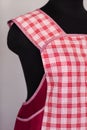 Kitchen female apron on mannequin Royalty Free Stock Photo