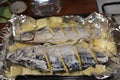 kitchen fish mackerel potatoes with lemon baking Royalty Free Stock Photo
