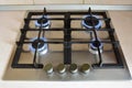 Kitchen gas stove with four burners burning blue flame Royalty Free Stock Photo