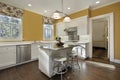 Kitchen with gold walls