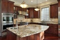 Kitchen with granite island Royalty Free Stock Photo